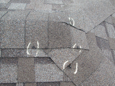 Marked punctures on a gray roof